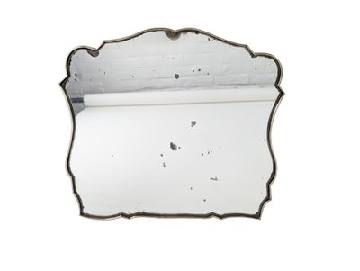 an image of a mirror that is on a white wall