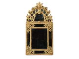 a gold frame with a mirror on it on a white background