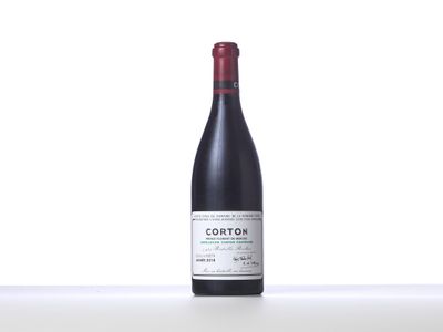 a bottle of wine that is sitting on a table