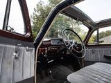 a view of the inside of a car from the driver ' s seat