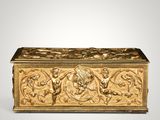 an image of a gold box with a design on it