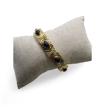 Bracelet jonc ouvrant en or jaune (750 millièmes) à maille f…