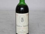 a bottle of wine that is sitting on a table