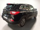 a picture of a black suv parked in a garage