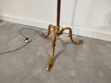 a table with a lamp on it in a room