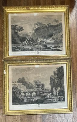 deux reproductions encadrées représentant un paysage de montagne avec une rivière au premier plan