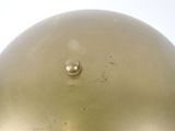 a close up of a gold helmet with a white background