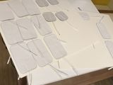 a table that has a bunch of electrodes on it