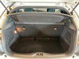 a trunk of a car with the back seats folded down