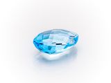 a blue topazte gems on a white background