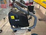 a machine that is sitting on a cart in a store