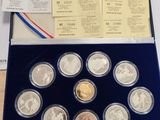 a lot of coins in a box on a table