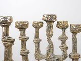 five candles that are sitting on a table