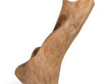 a piece of wood that is sitting on a white surface