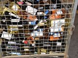 many bottles of wine in a metal cage
