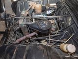 a picture of a car engine in the back of a truck