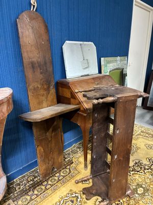 a wooden desk with a mirror on top of it