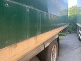 a truck that is parked on the side of the road