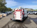 a white truck that is parked in a parking lot