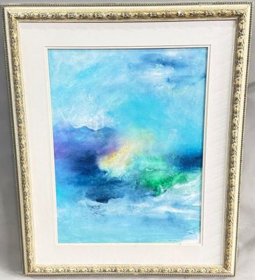 un tableau représentant des vagues bleues et vertes, dans un cadre blanc