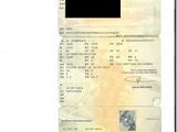 an image of a picture of a document with a picture of a person on it
