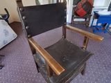 a chair that is sitting in the middle of a room