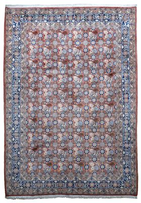 un tapis rouge et bleu sur fond blanc