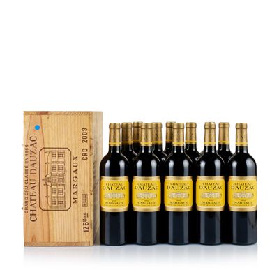 six bottles of red wine in a wooden box next to a wooden box