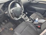 a picture of a car dashboard with a steering wheel