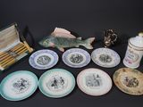 a lot of plates that are sitting on a table