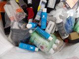 a white bag full of assorted items in it