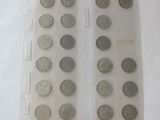 a lot of coins in a plastic bag on the table