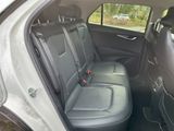 the back seats of a car are empty with no one in it