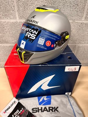 a helmet on top of a box on a table