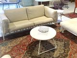 an image of a living room with a lot of furniture in it