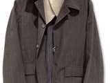 a suit jacket and tie hanging on a hanger