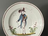 a plate with a picture of a man on it