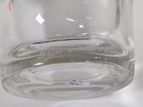 a close up of a glass jar with water in it