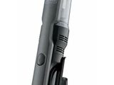 an image of a black and silver electric hair dryer on a stand