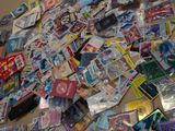 a pile of pokemon cards on the floor of a room