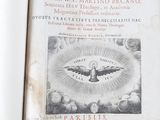 an old book with a picture of a bird on it