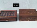 two wooden boxes that are sitting on a table