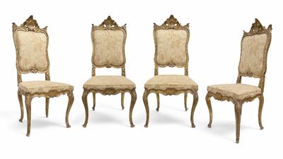 four chairs with upholstered back and upholstered seat covers