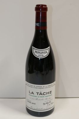 a bottle of wine that is sitting on a table