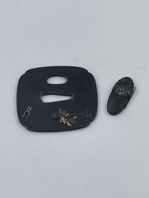 a picture of a small black object on a white surface