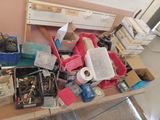 a table with a lot of assorted items on top of it