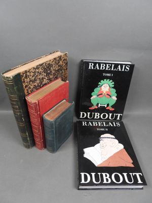 a couple of books sitting on top of a table next to each other