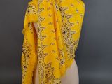 a yellow scarf on a mannequin mannequin mannequin mannequin mannequin mannequin mannequin mannequin mannequin