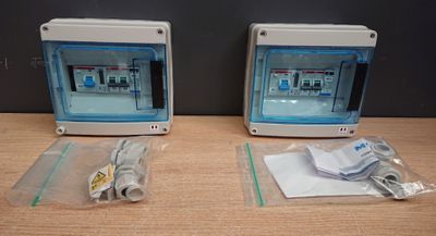 two computers that are sitting on a table