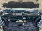 the engine of a car with its hood open and the hood open